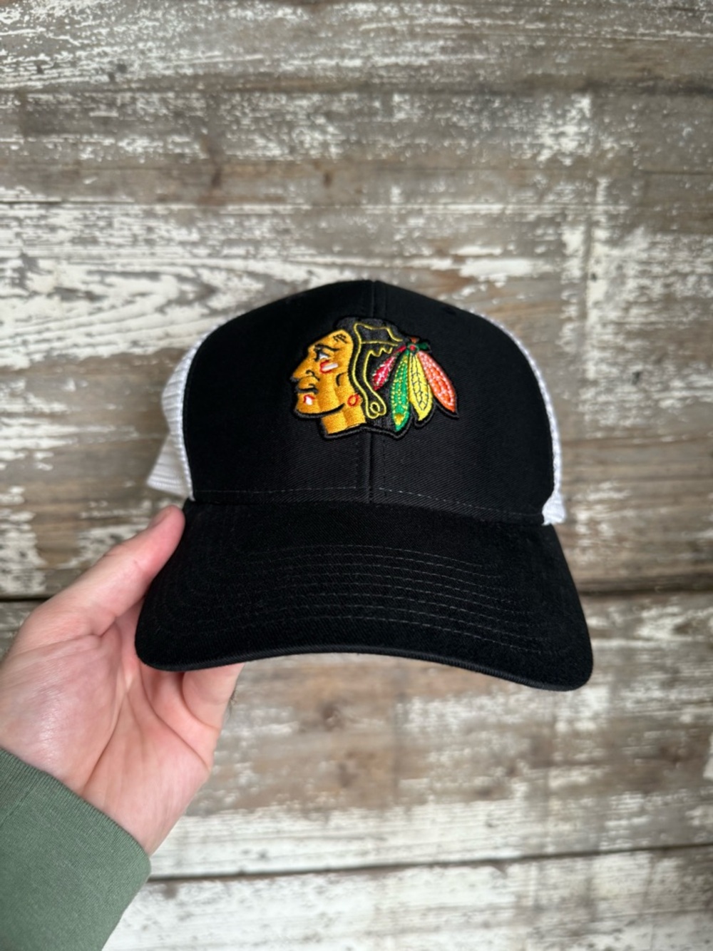 Chicago Blackhawks black and white trucker hat made on Reebok.